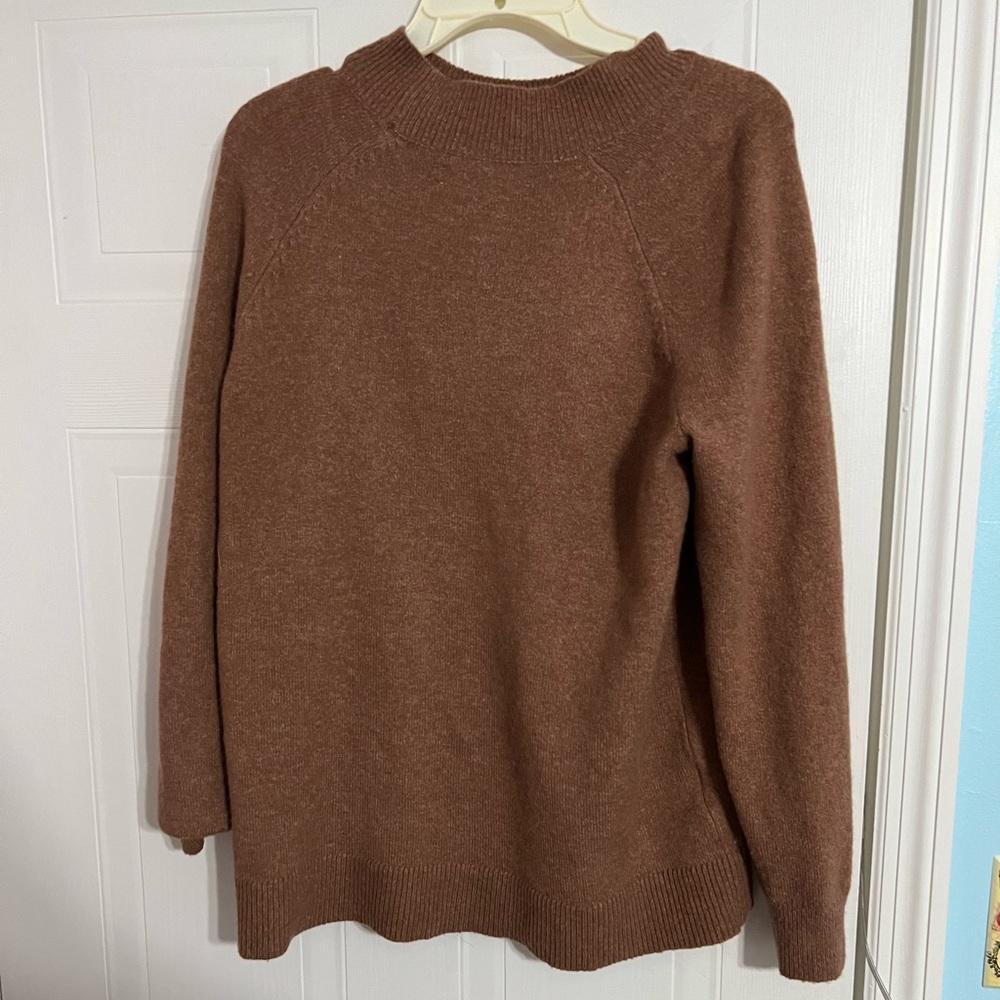 A soft, brown, long sweater